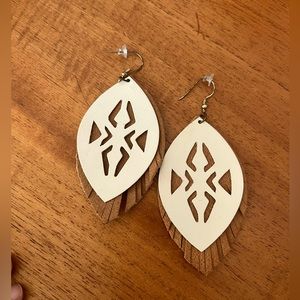 Noonday Collection suede double layer fringe earrings.